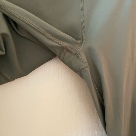 ATHLETA Ultimate Stash Pocket 7/8 Tight in Laurel Olive - SP - Picture 13 of 16